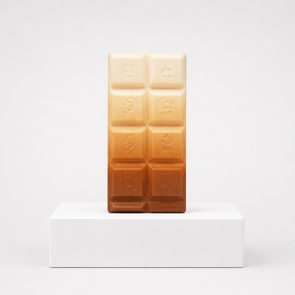 Cream-to-brown gradient chocolate-bar squishy with embossed characters