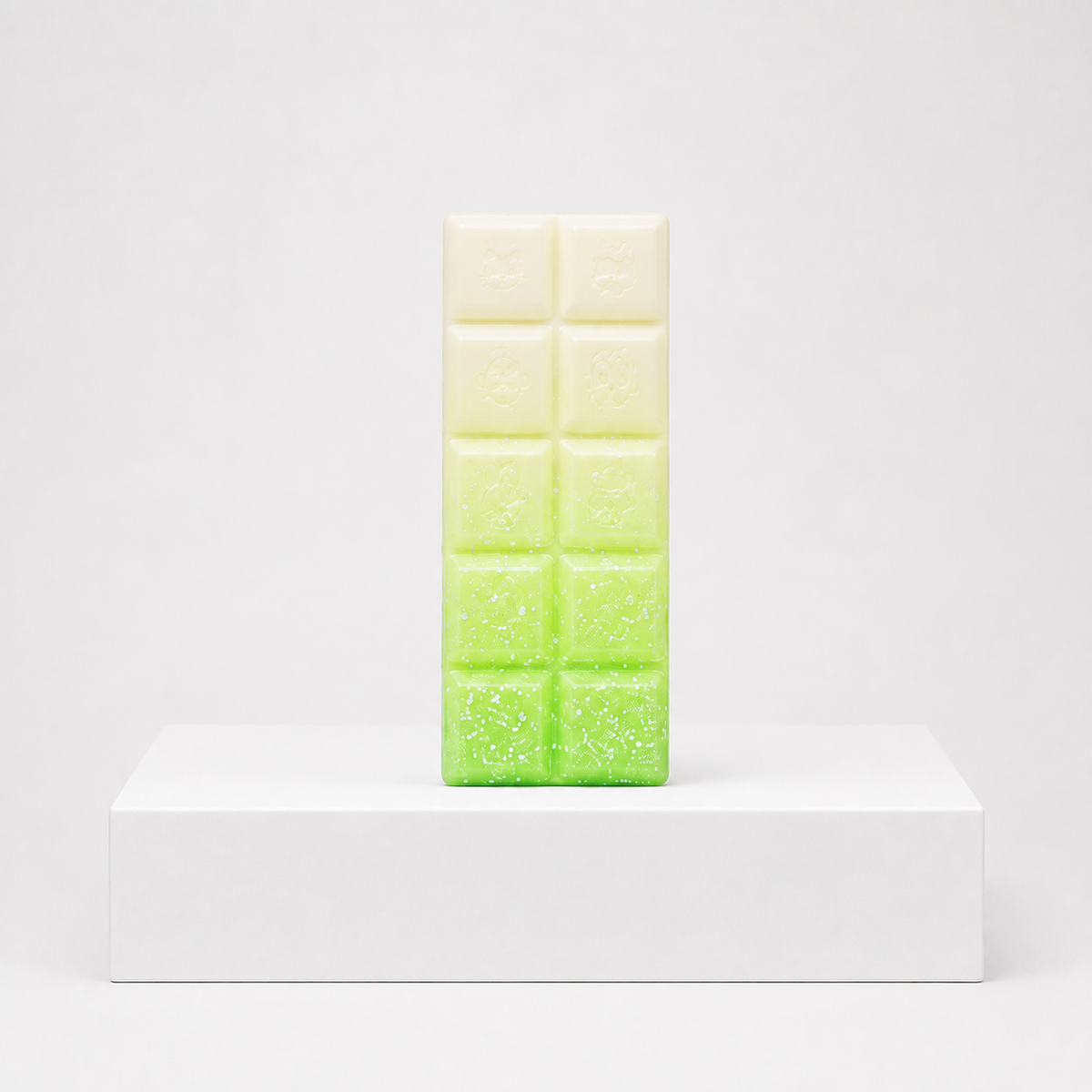 White-to-neon-green gradient chocolate-bar squishy with white speckles