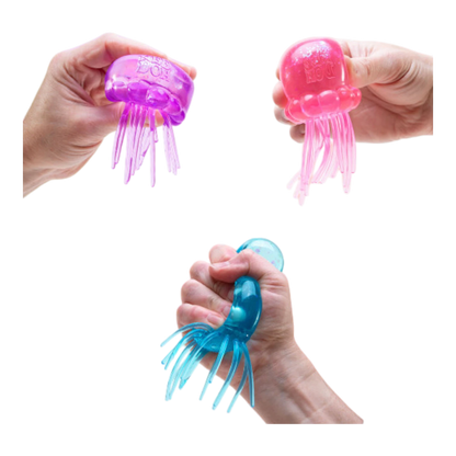 Squish Planet NeeDoh JellySquish fidget toy in purple, pink, and blue, shaped like a jellyfish with dangling tentacles.