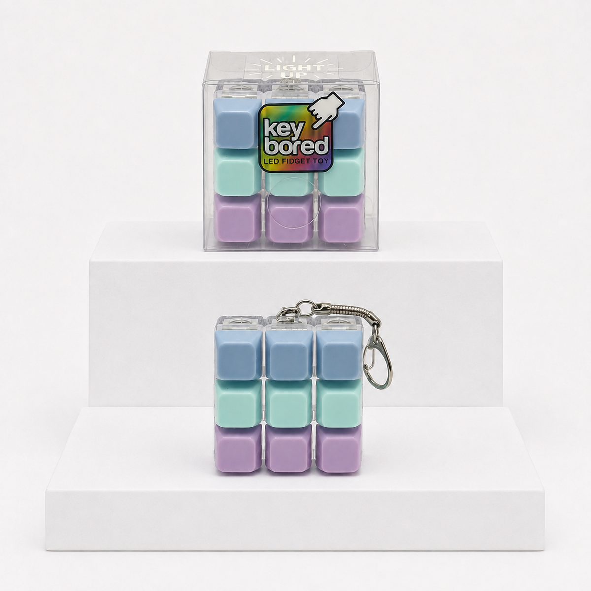 Blue-purple Key Bored LED fidget toy with matching clear box