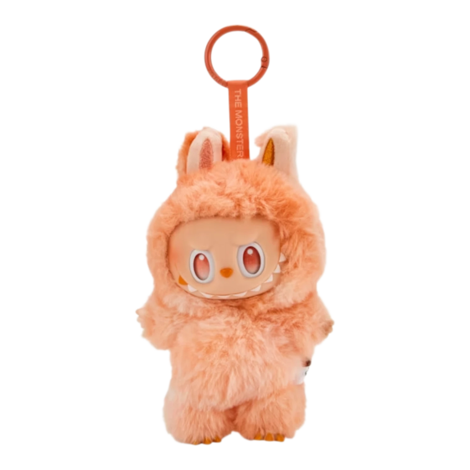 Squish Planet orange fuzzy Labubu monster pendant with plush ears and vinyl face, part of the Big into Energy series.