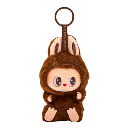 Squish Planet Labubu The Monsters Have a Seat Series vinyl plush pendant, brown fuzzy monster with big eyes and seated pose.