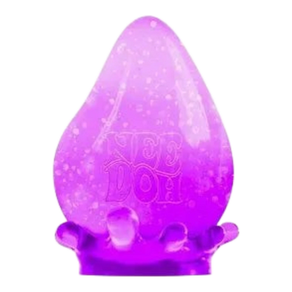 Squish Planet NeeDoh Dream Drop fidget toy, a purple, droplet-shaped, squishy stress-relief toy with glitter.