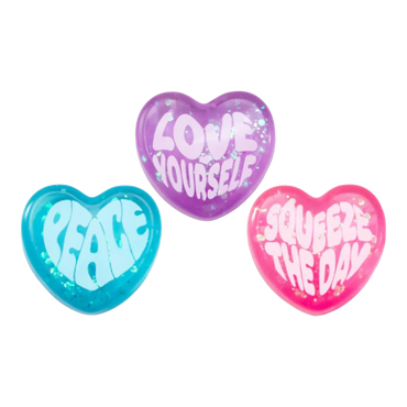 Squish Planet NeeDoh Good Vibes Only heart-shaped fidget toys in blue, purple, and pink with positive affirmations.