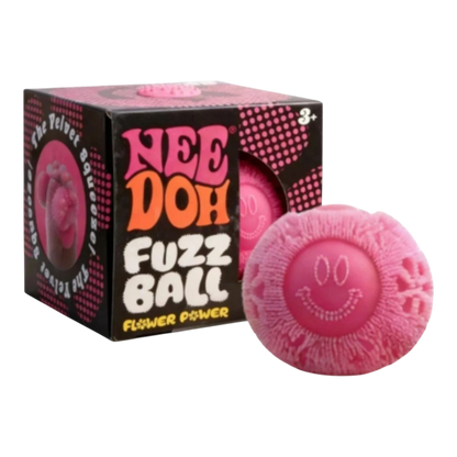 Squish Planet NeeDoh Fuzz Ball Flower Power fidget toy, pink fuzzy exterior with smiley face, soft squishy core for stress relief.