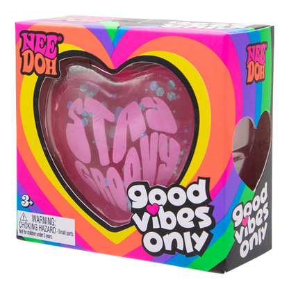Squish Planet NeeDoh Good Vibes Only heart-shaped fidget toy with pink glitter and "Stay Groovy" text.