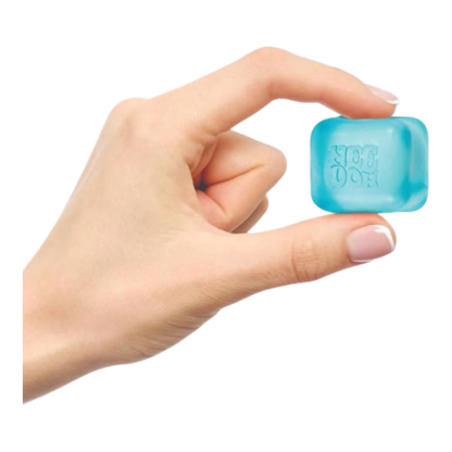 Squish Planet NeeDoh Nice Ice Baby squishy fidget toy, a small blue cube with embossed lettering, held between fingers.