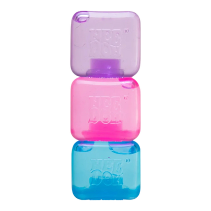Squish Planet NeeDoh Nice Ice Baby fidget toy, a stack of three squishy cubes in pastel purple, pink, and blue, with embossed branding.