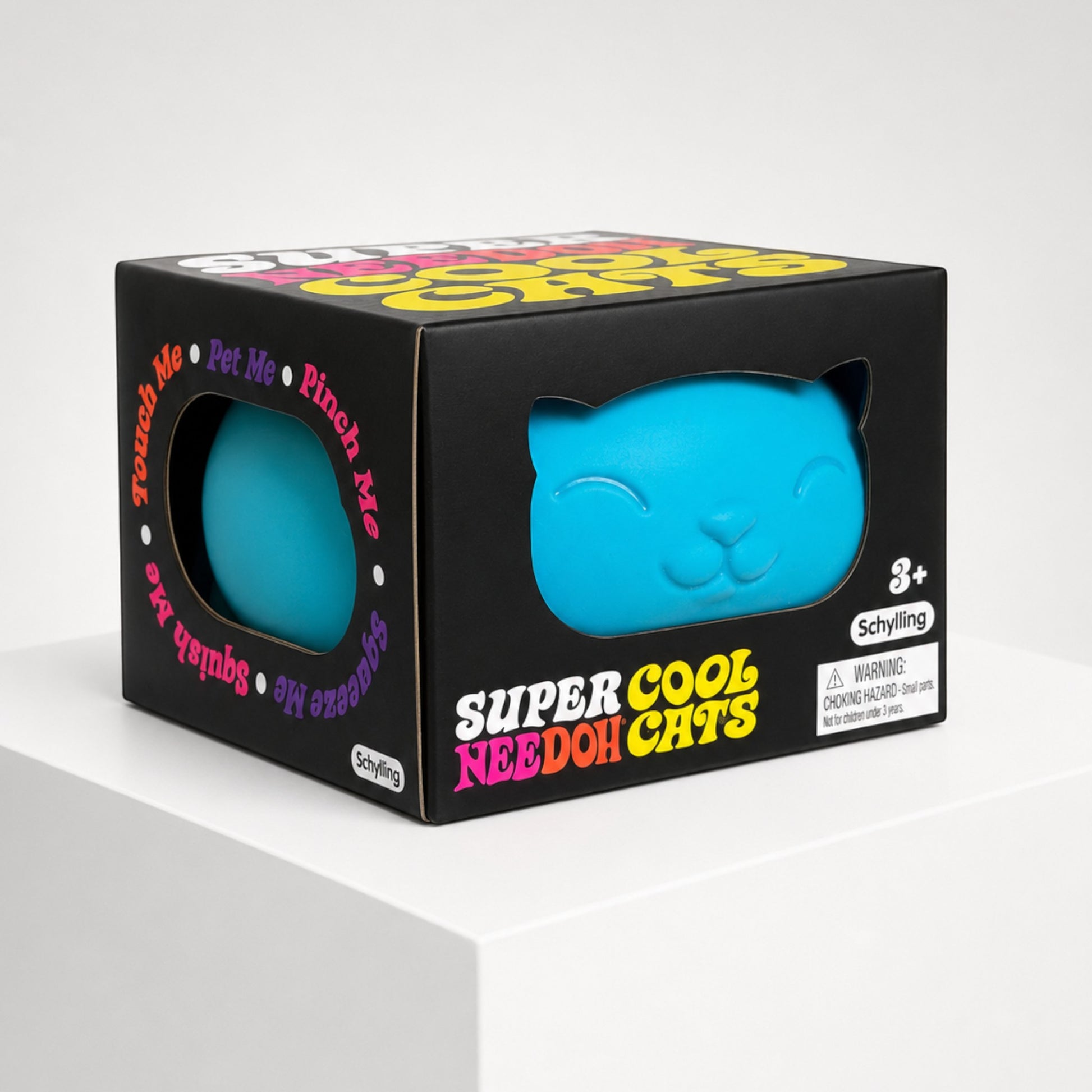 Squish Planet NeeDoh Super Cool Cat blue squishy fidget toy in its black retail display box on a white pedestal.
