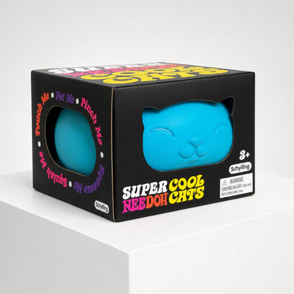 Squish Planet NeeDoh Super Cool Cat blue squishy fidget toy in its black retail display box on a white pedestal.