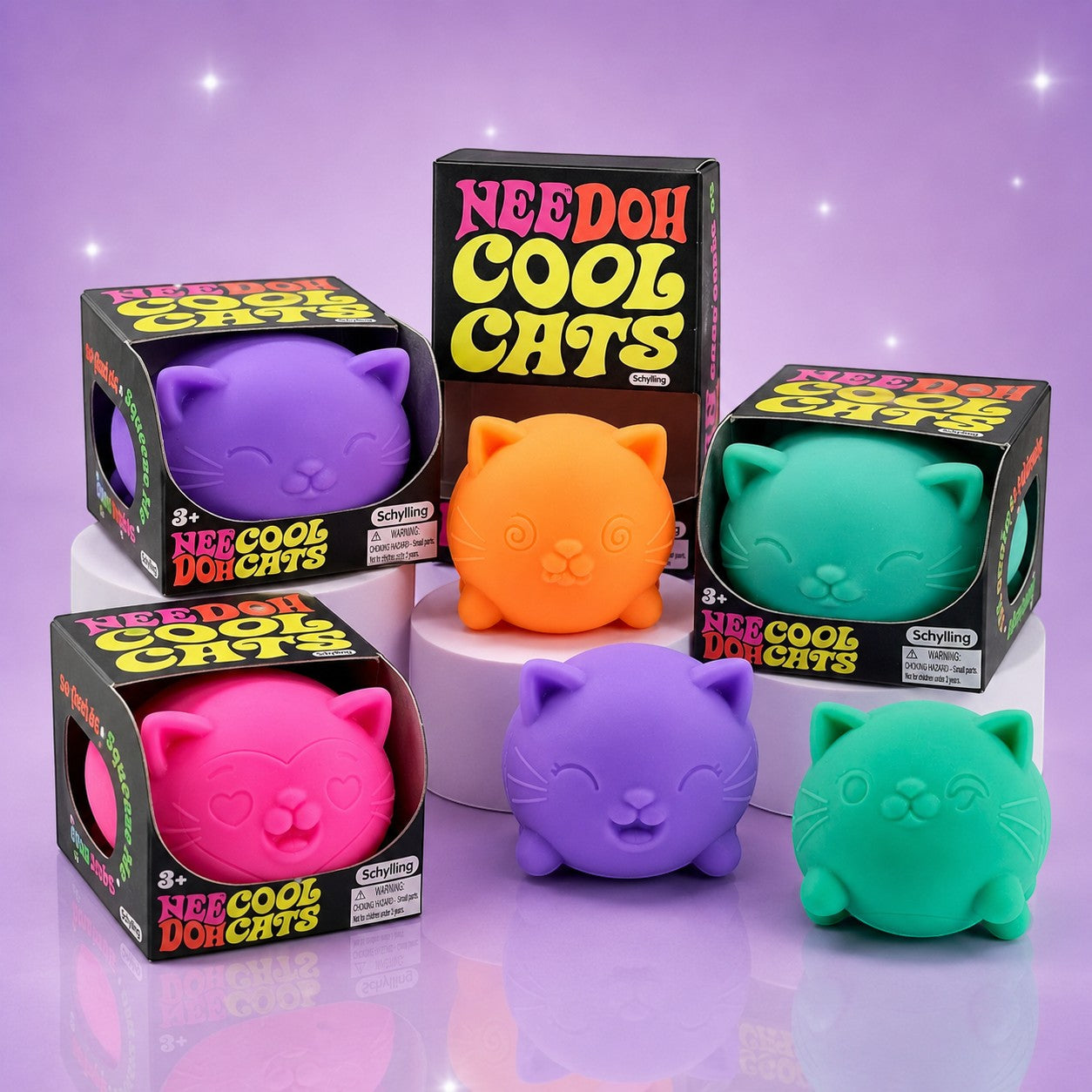 Squish Planet NeeDoh Cool Cat squishy fidget toys in purple, orange, pink, and teal on display with packaging.