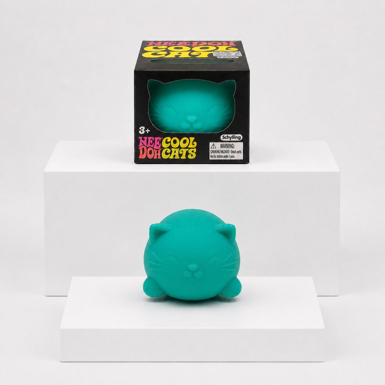 Teal NeeDoh Cool Cat squishy with matching retail package