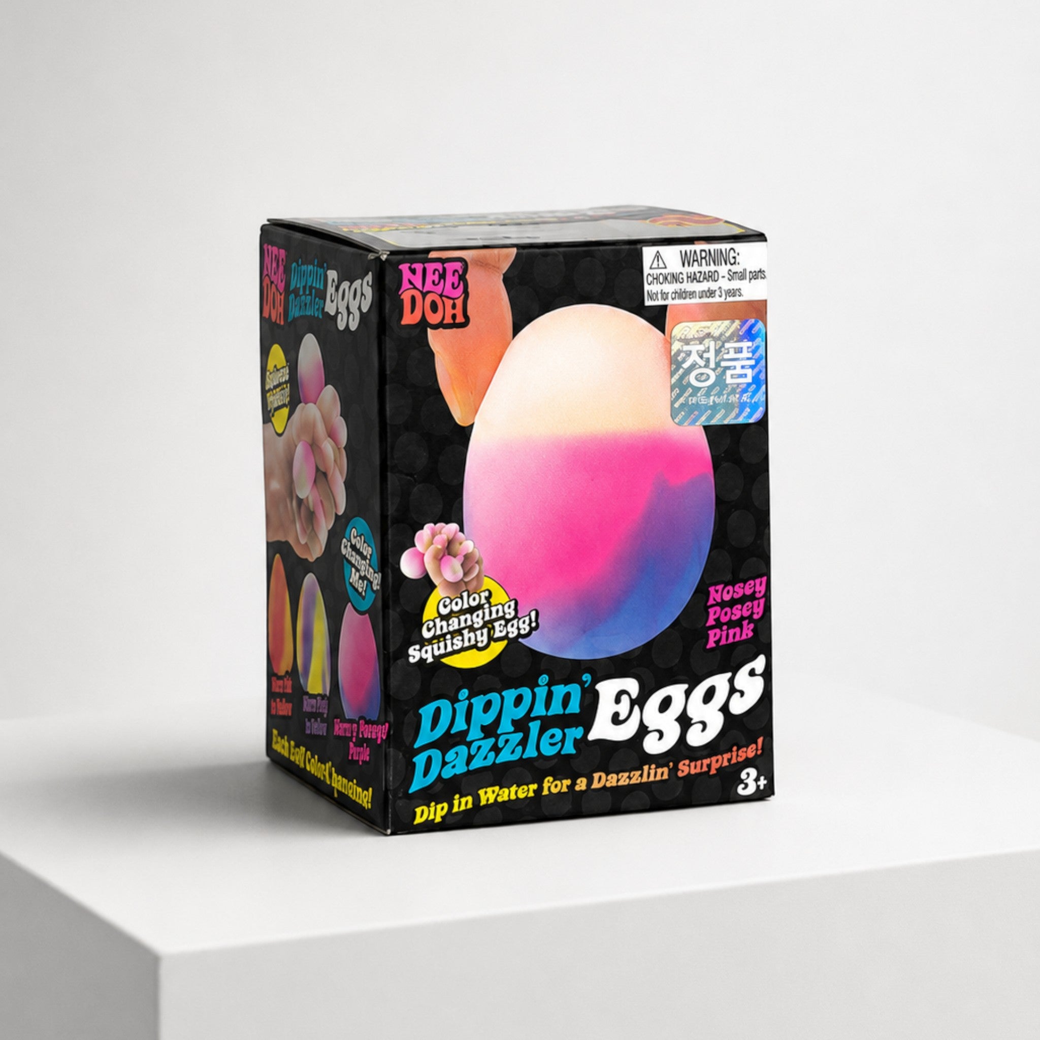 Squish Planet NeeDoh Dippin Dazzler Egg squishy fidget toy in its colorful retail packaging box.