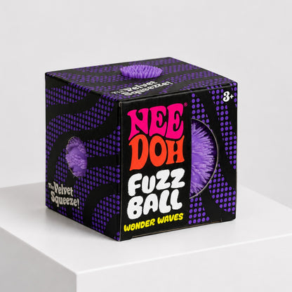 Squish Planet NeeDoh Fuzz Ball Wonder Waves purple velvet textured fidget toy in its black and purple display box.