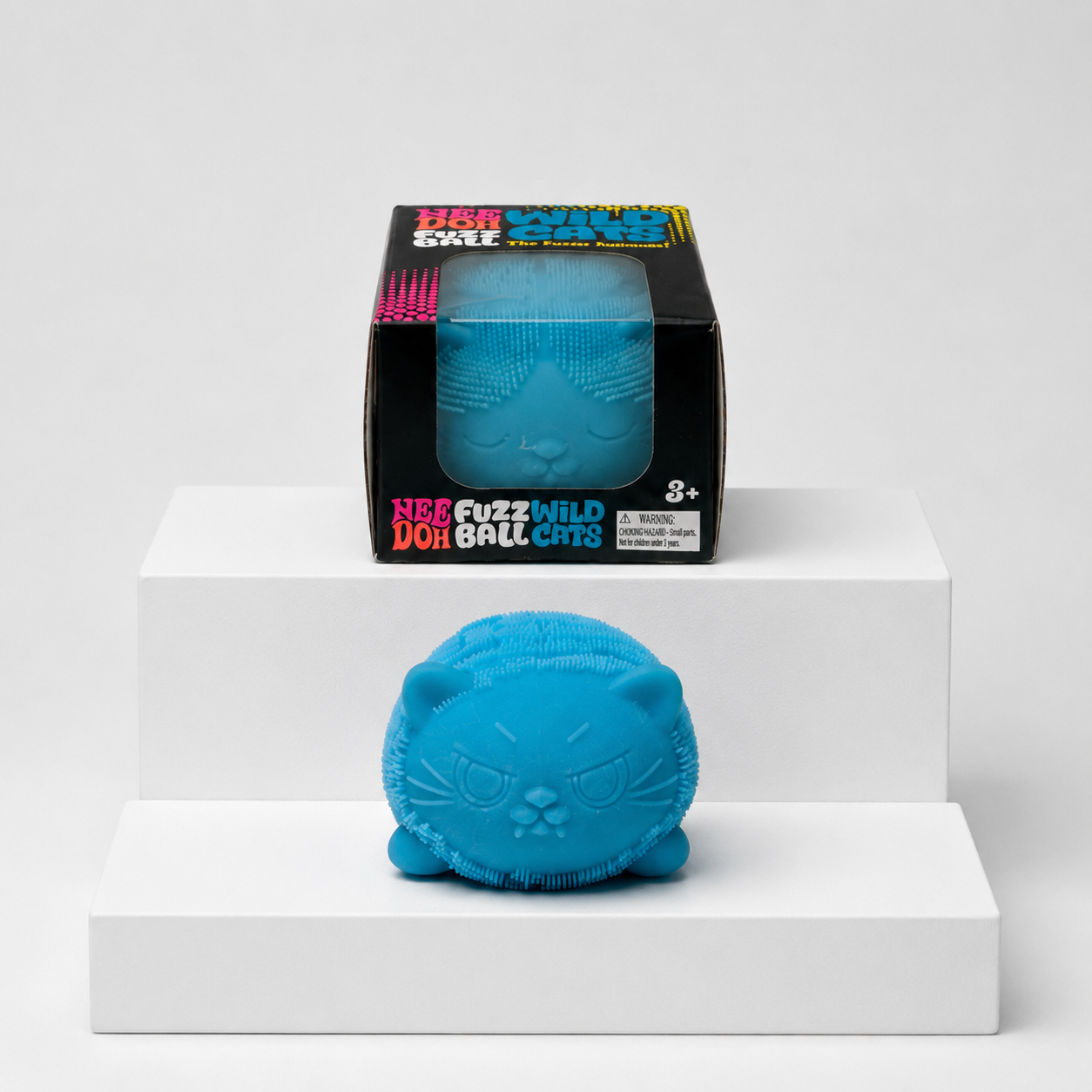 Blue NeeDoh Fuzz Ball Wild Cats squishy with matching retail package, front view