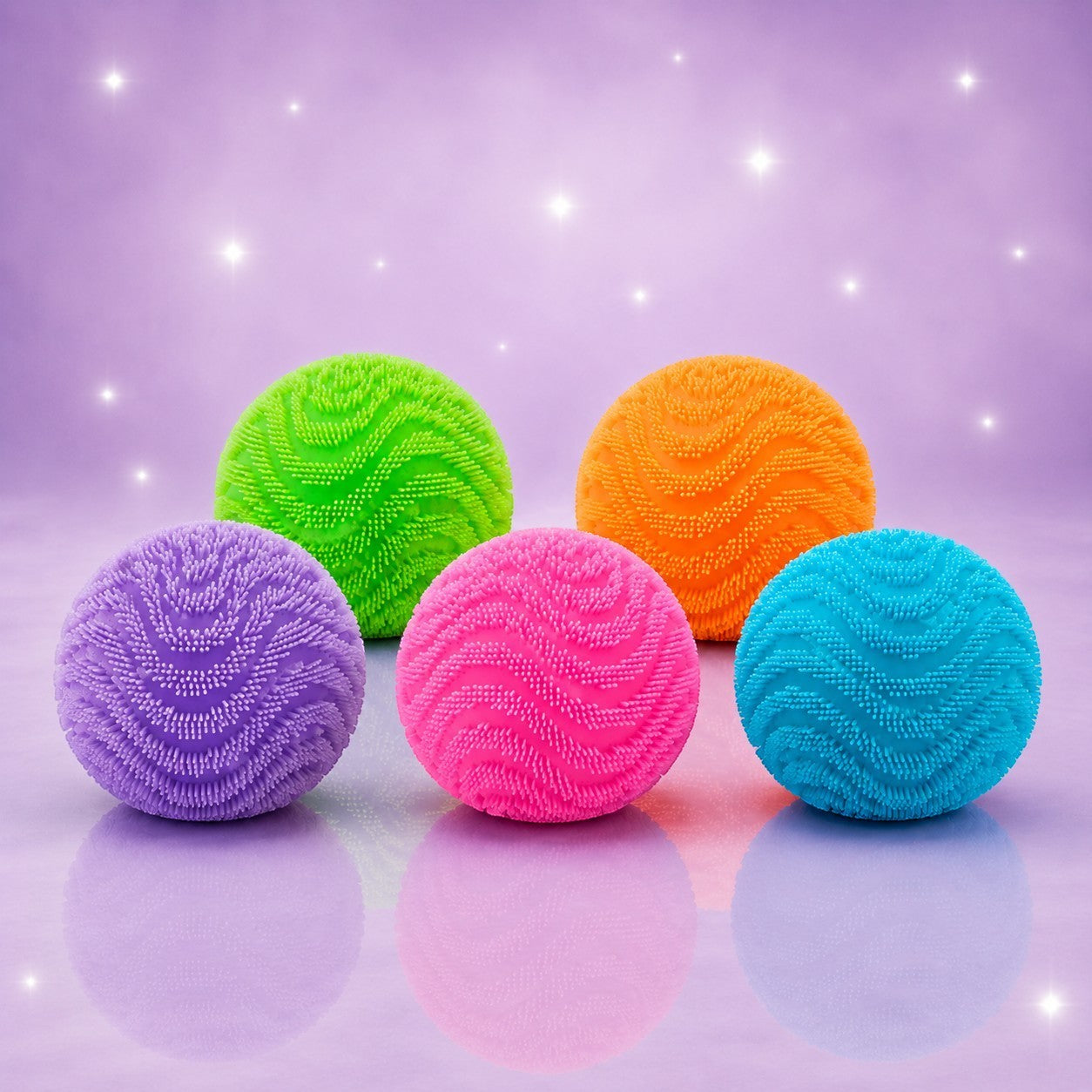 Squish Planet NeeDoh Fuzz Ball Wonder Waves fidget toys in purple, green, orange, pink, and blue with wave textures.