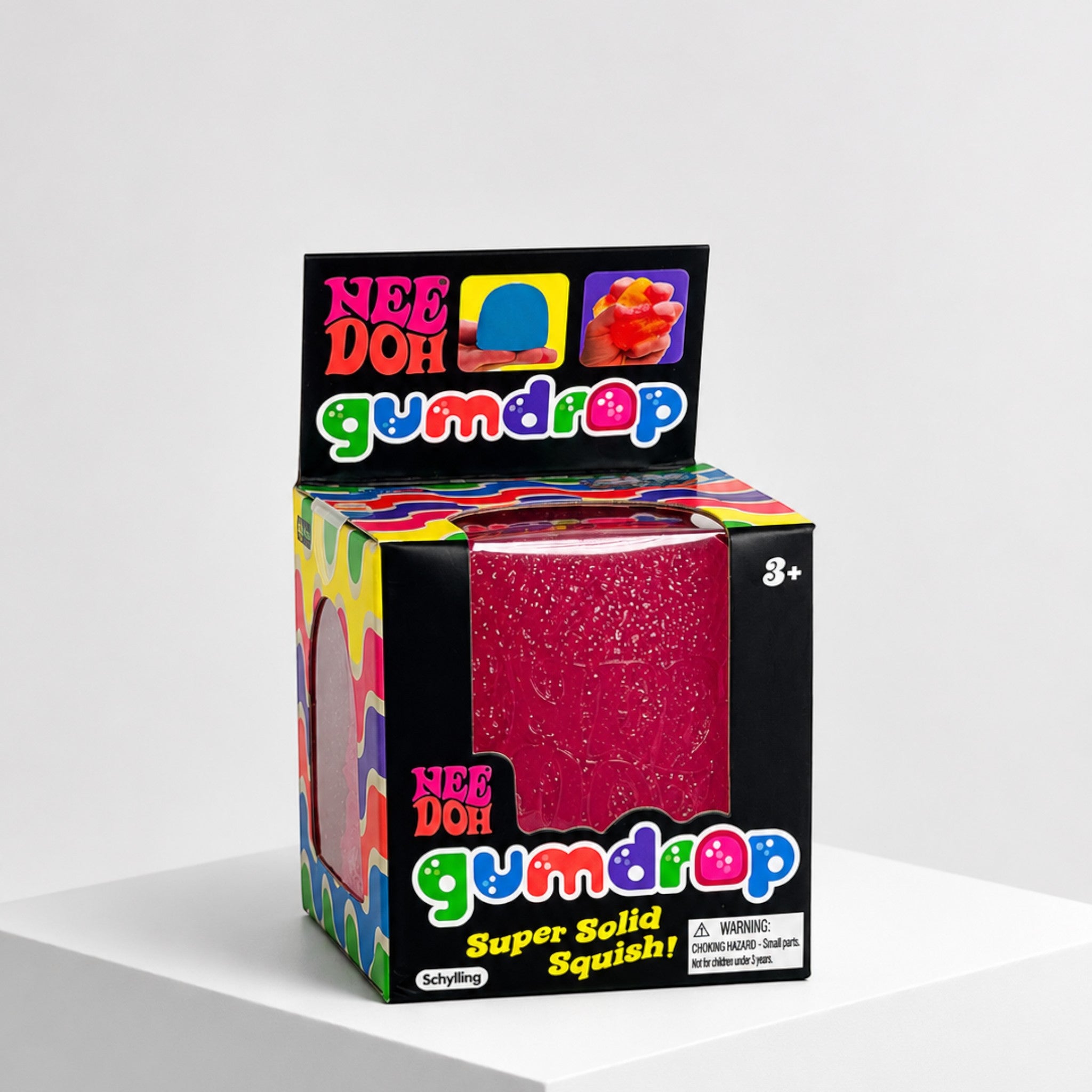 Squish Planet NeeDoh Gumdrop squishy fidget toy in its colorful candy-themed retail packaging box.