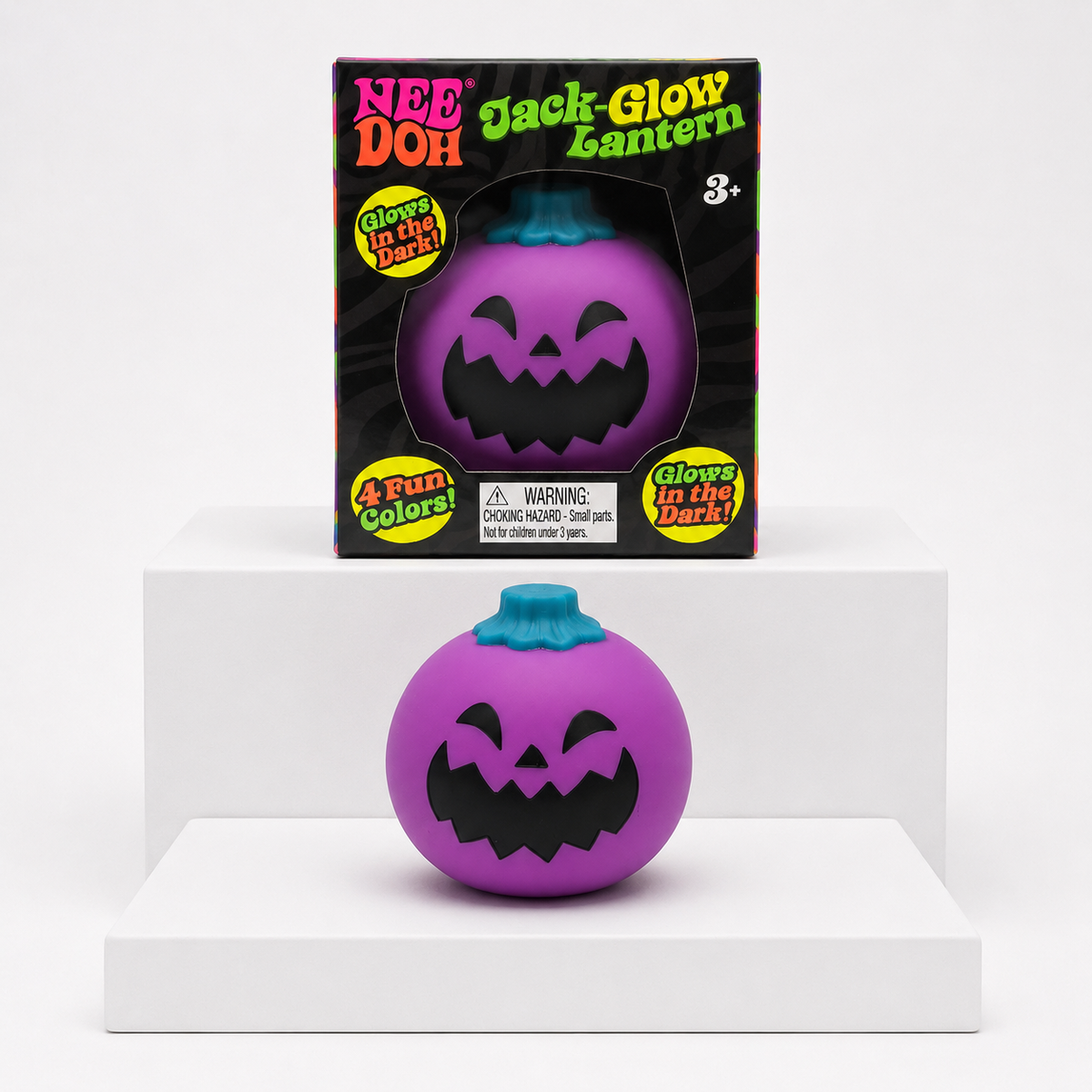 Purple NeeDoh Jack-Glow Lantern toy with matching retail box