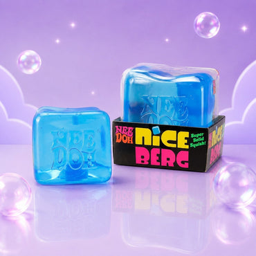 Squish Planet NeeDoh Nice Berg translucent blue ice-cube shaped squishy fidget toy on a purple background