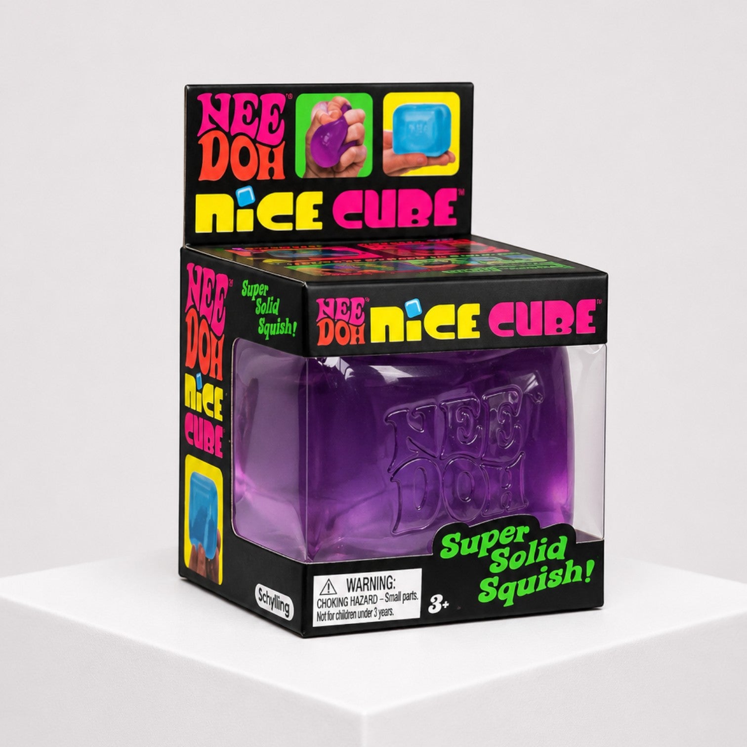 Squish Planet purple NeeDoh Nice Cube sensory fidget toy in its branded retail packaging box on a white pedestal.