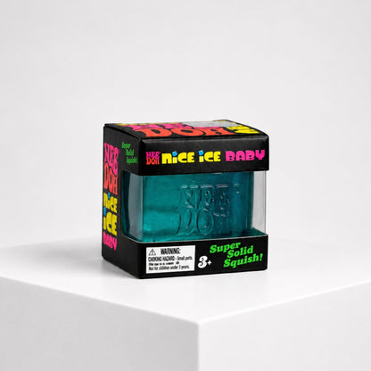 Squish Planet NeeDoh Nice Ice Baby blue cube fidget toy in its branded display box on a white pedestal.