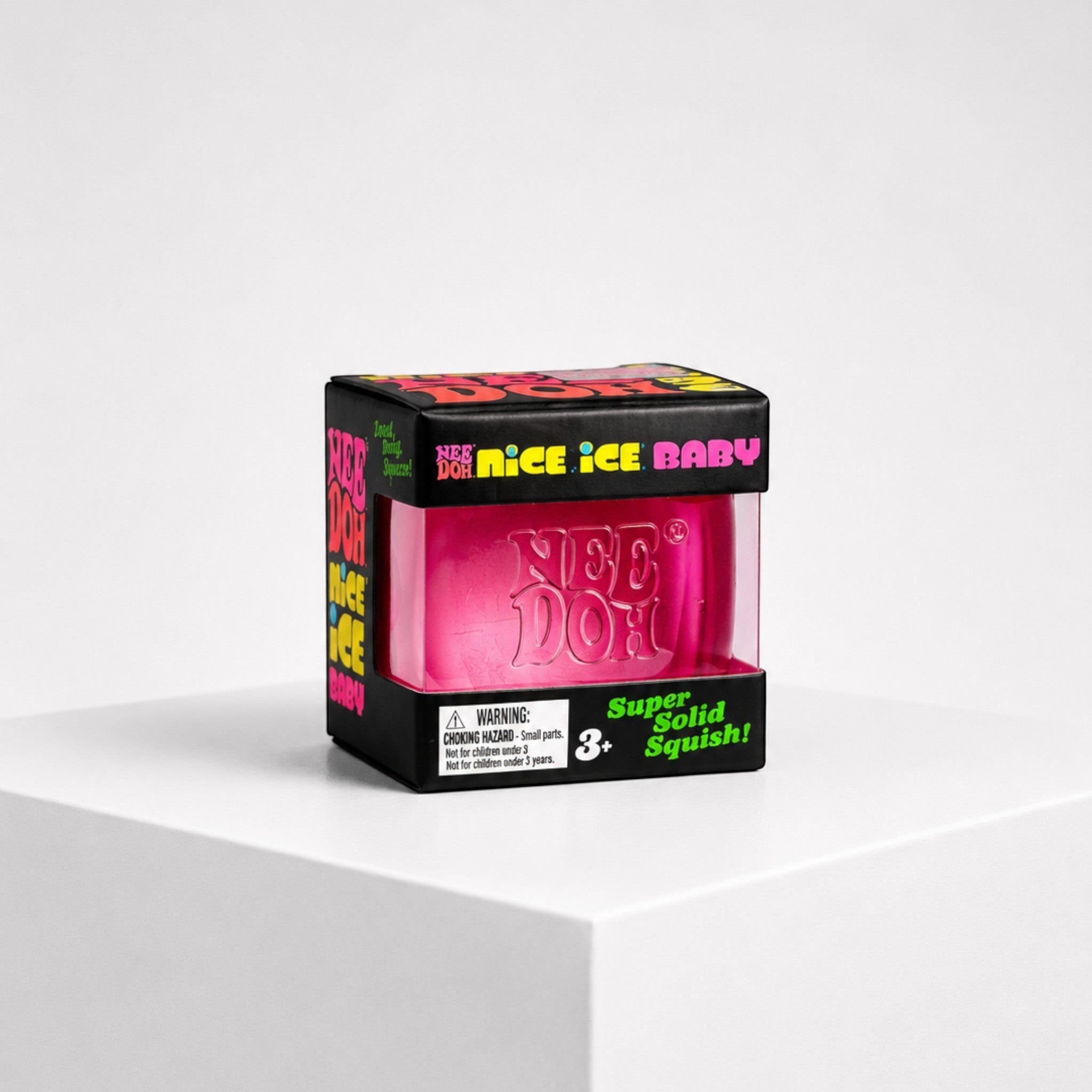Squish Planet NeeDoh Nice Ice Baby pink squishy fidget toy in its branded black display box on a white pedestal.