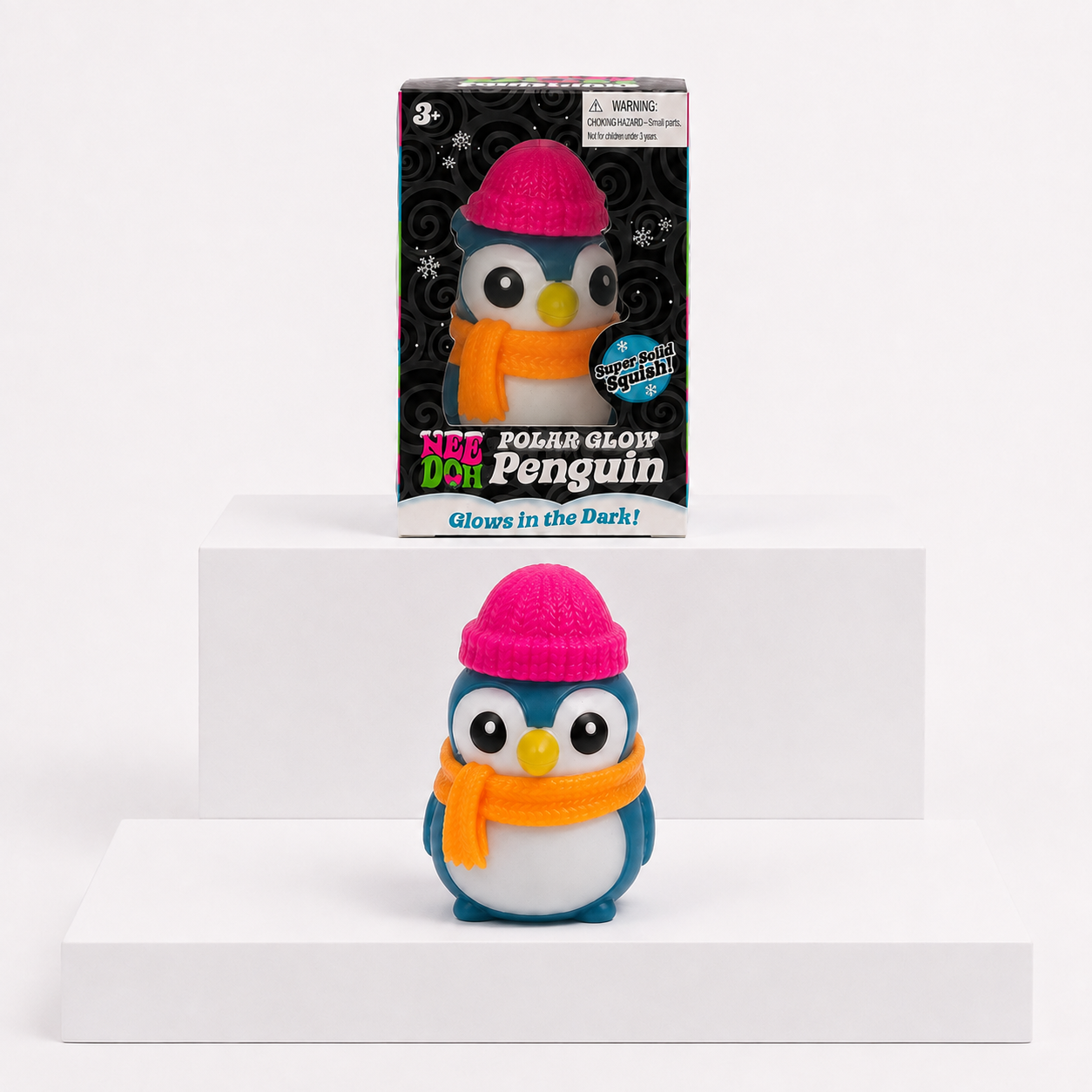 NeeDoh Polar Glow Penguin with pink hat and retail box