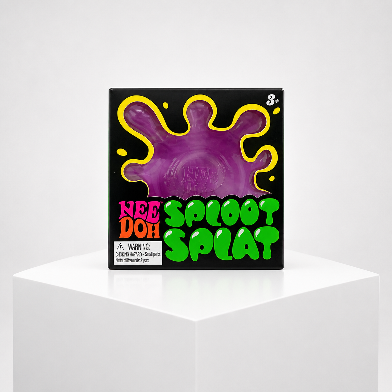 NeeDoh Sploot Splat purple squishy fidget toy in retail packaging on a white studio pedestal.