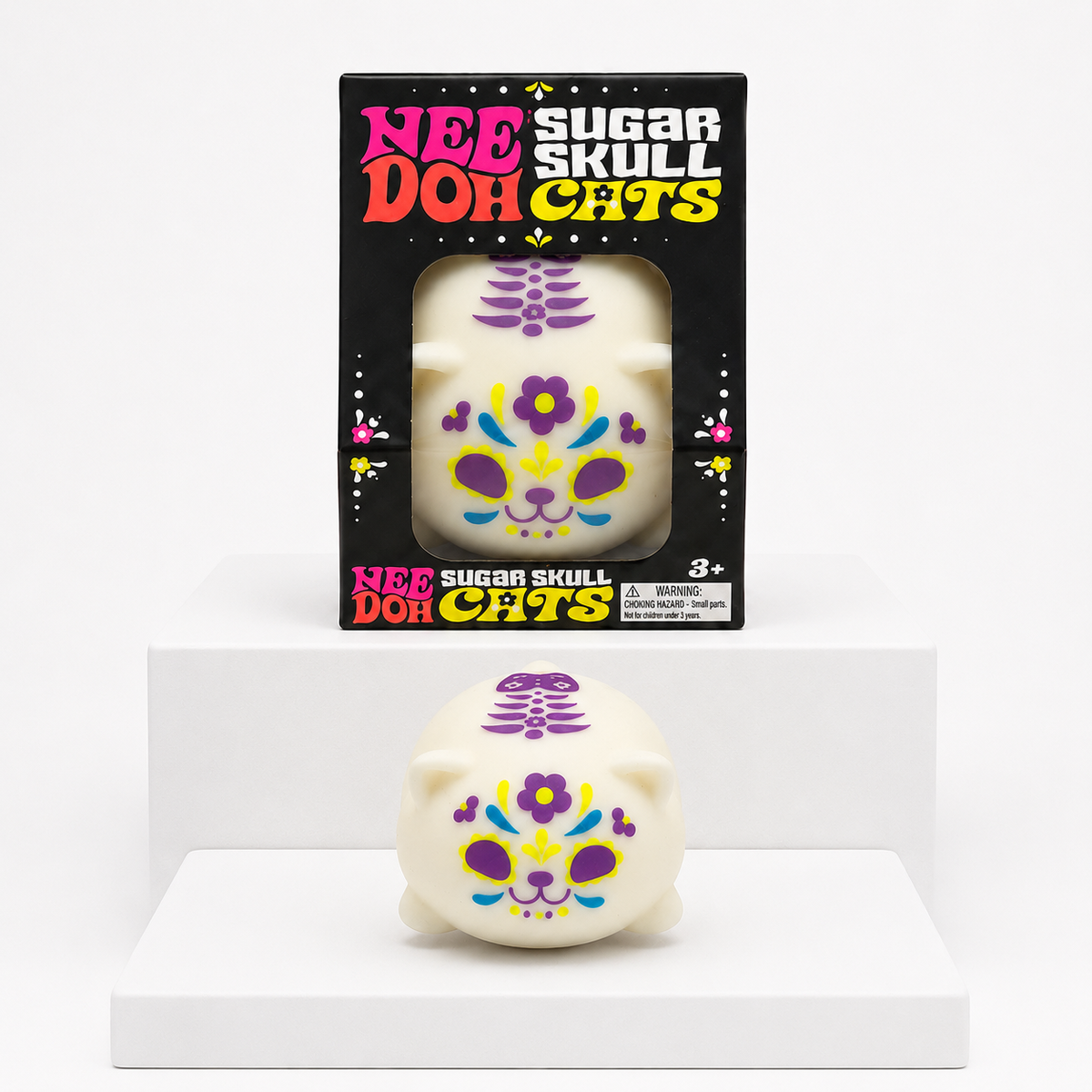 Purple-design NeeDoh Sugar Skull Cool Cat with matching retail box
