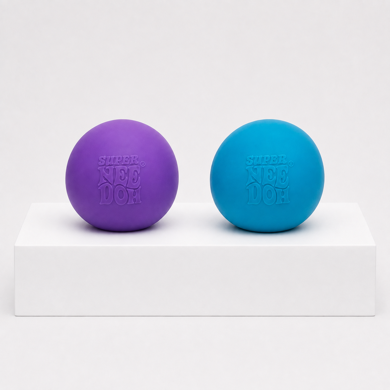 Purple and blue NeeDoh Super Groovy Glob Squishy Fidget Toys