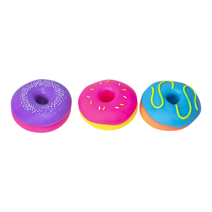 Squish Planet NeeDoh Dohnuts squishy fidget toys in purple, pink, and blue with frosting details.
