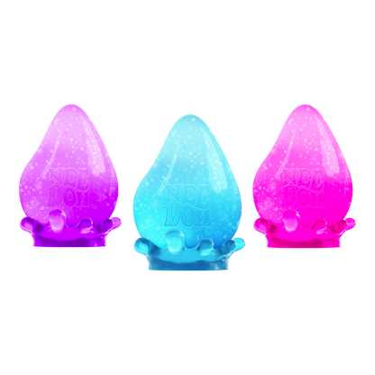Squish Planet NeeDoh Dream Drop fidget toy in pink, blue, and purple gradient colors. Soft, slow-rising squishy texture.