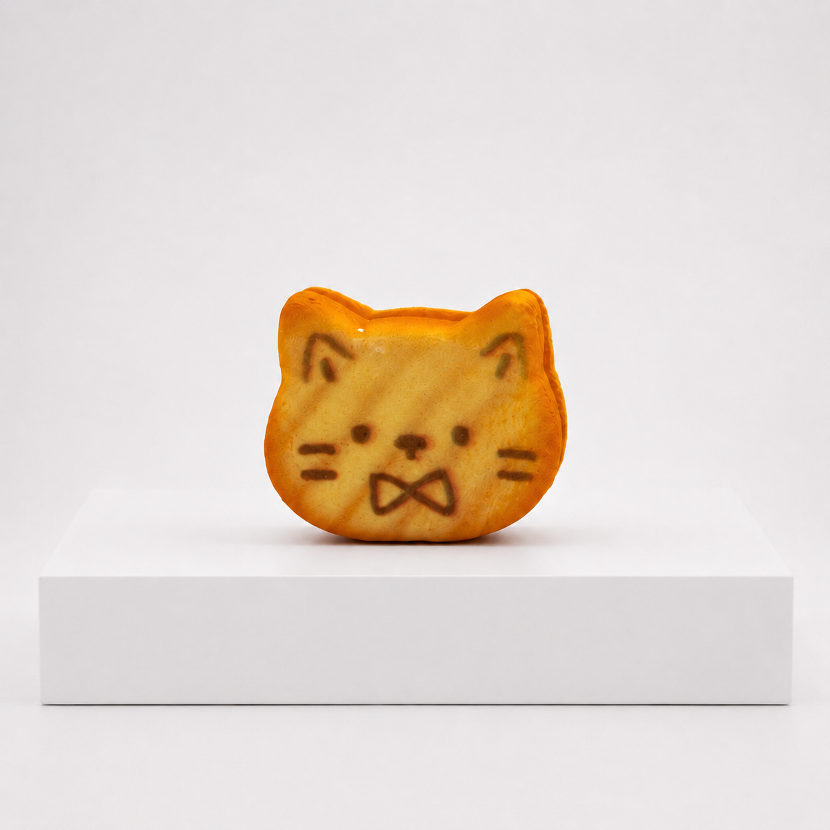 Nyang Nyang Cat Toasted Bread Slow Rise Squishy Fidget Toy – Bow Tie variant