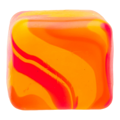 Squish Planet orange and red swirl cube fidget toy with slow-rising squish texture.
