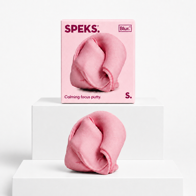 Blush pink Speks Blur Focus Putty with matching box on a neutral white studio background