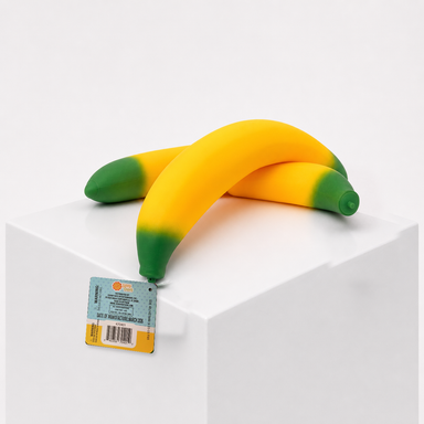 Two crossed Sunny Days Squeeezy Banana toys with green tips and product tags