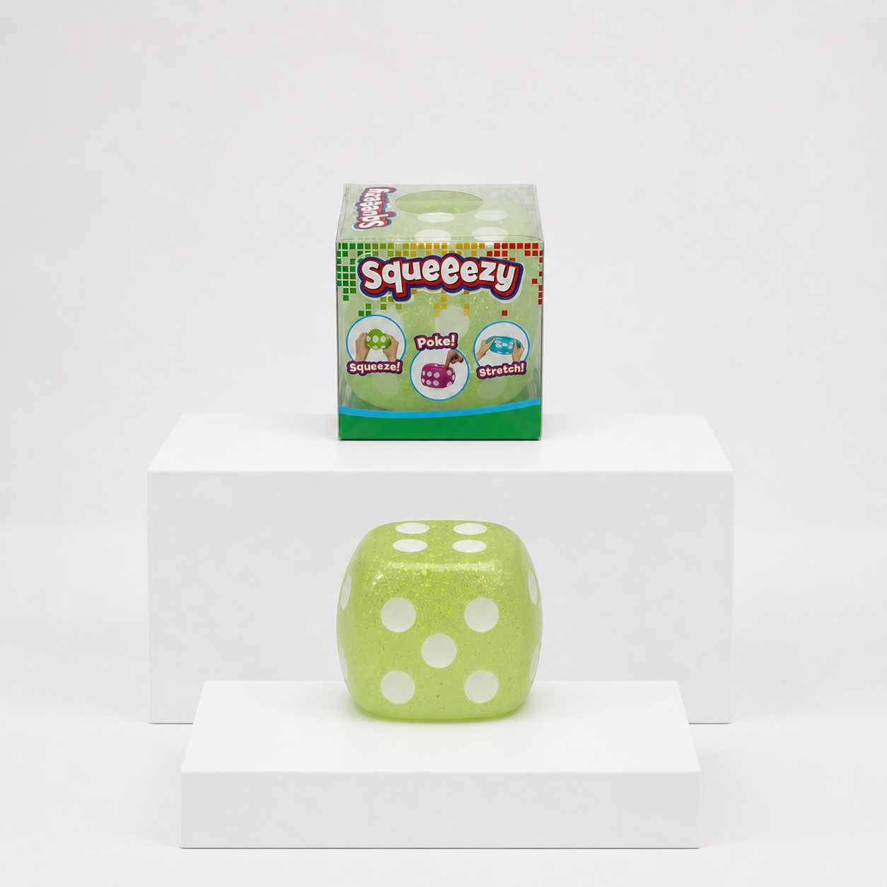 Green Squeeezy Dice sensory fidget toy with packaging