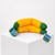 Sunny Days Entertainment Squeeezy Banana sensory fidget toy in orange and green with product tag.