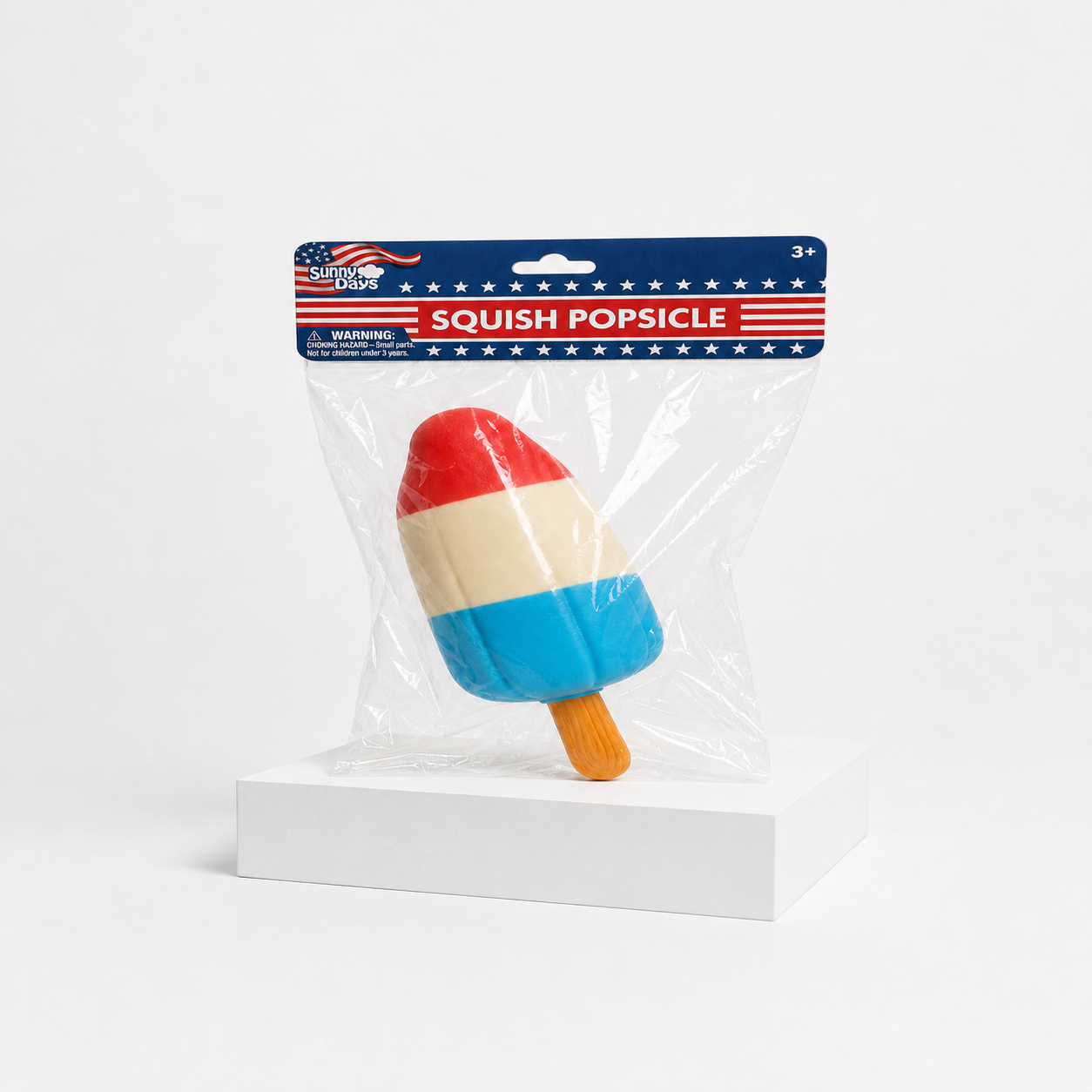 Sunny Days Squish Popsicle sealed retail package on a white podium