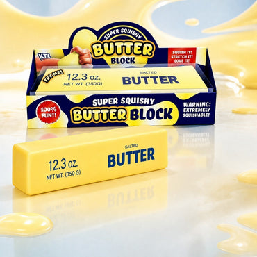 Squish Planet KTL jumbo butter block sensory fidget toy with dough-filled soft texture in yellow packaging