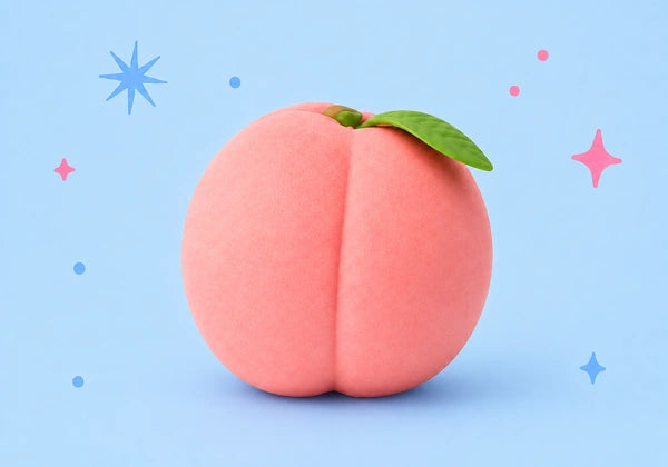 Squeeezy Peach toy sitting on a white studio slab